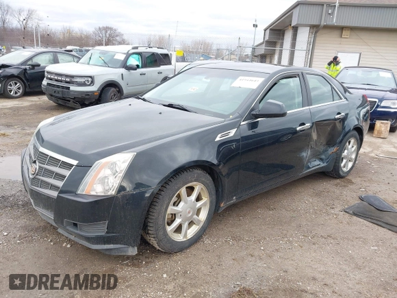 2009 Cadillac CTS AWD z VIN 1G6DG577690116381, wystawiony jako IAAI lot #41944644 z przebiegiem 171 745 mil mil oraz . Historia ofert i sprzedaży dostępna na DreamBid. Obrazek 2.