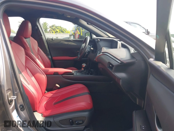 2021 Lexus UX 250h F Sport z VIN JTHE9JBHXM2045377, wystawiony jako IAAI lot #42580566 z przebiegiem 52 838 mil mil oraz . Historia ofert i sprzedaży dostępna na DreamBid. Obrazek 5.