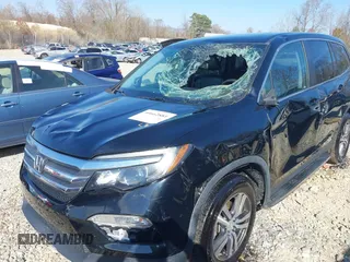 2018 Honda Pilot EX-L with VIN 5FNYF6H59JB062326, listed as a IAAI auction lot 40662881 with 77,573 mi miles and . Bid and sale history available at DreamBid. Image 6.