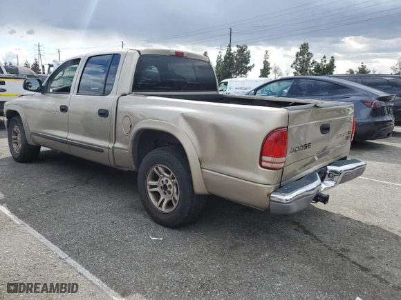 2004 Dodge Dakota SLT with VIN 1D7HL48N44S587448, listed as a Copart auction lot 45541925 with 305,432 mi miles and Salvage Title. Bid and sale history available at carsss.com. Image 2.