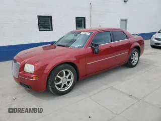 2007 Chrysler 300 Touring z VIN 2C3KA53G57H858764, wystawiony jako Copart lot #50928775 z przebiegiem 129 258 mil mil oraz Szkoda całkowita • Salvage title. Historia ofert i sprzedaży dostępna na DreamBid. Obrazek 1.