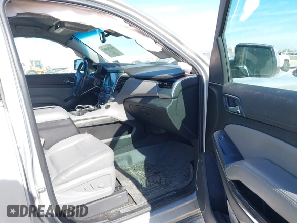 2020 Chevrolet Tahoe LT with VIN 1GNSCBKC5LR226822, listed as a IAAI auction lot 41334853 with 77,091 mi miles and . Bid and sale history available at DreamBid. Image 5.