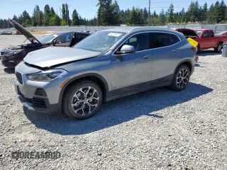 2023 BMW X2 xDrive28i with VIN WBXYJ1C09P5V69690, listed as a Copart auction lot 61105753 with 16,768 mi miles. Bid and sale history available at carsss.com. Image 1.