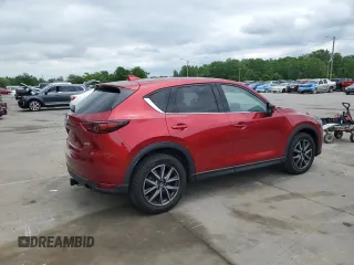 2018 Mazda CX-5 Grand Touring with VIN JM3KFADM8J0444455, listed as a Copart auction lot 59793055 with 60,839 mi miles and Salvage title. Bid and sale history available at DreamBid. Image 3.