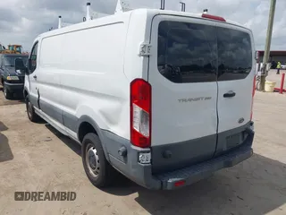 2015 Ford Transit Cargo with VIN 1FTYR2ZM2FKA86869, listed as a IAAI auction lot 42635477 with 14,695 mi miles and . Bid and sale history available at DreamBid. Image 3.