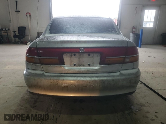 2001 Saturn LS z VIN 1G8JU52F81Y561891, wystawiony jako Copart lot #47767115 z przebiegiem Nie podano mil oraz Nie do naprawy • Non repairable. Historia ofert i sprzedaży dostępna na DreamBid. Obrazek 6.