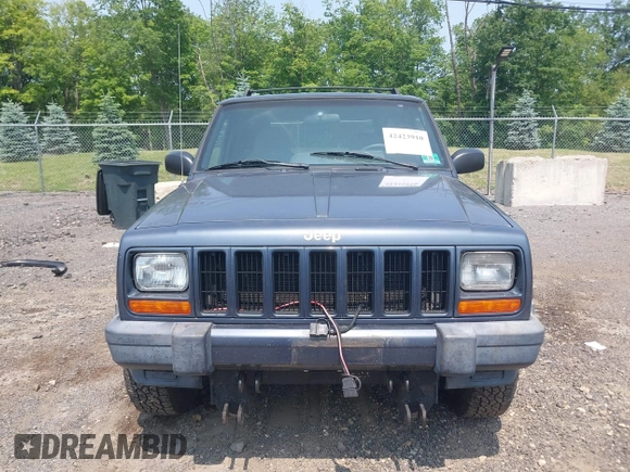 2001 Jeep Cherokee Sport z VIN 1J4FF48S51L531033, wystawiony jako IAAI lot #42423910 z przebiegiem 90 438 mil mil oraz . Historia ofert i sprzedaży dostępna na DreamBid. Obrazek 6.