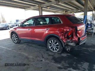 2014 Mazda CX-9 Grand Touring z VIN JM3TB2DVXE0439729, wystawiony jako Copart lot #49188875 z przebiegiem 113 839 mil mil oraz Szkoda całkowita • Salvage title. Historia ofert i sprzedaży dostępna na DreamBid. Obrazek 2.
