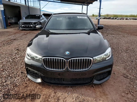 2019 BMW 7 Series 740i с VIN WBA7E2C55KB454929, выставлен на аукционе Copart как лот 49166235 с пробегом 57 051 миль миль и Списание • Salvage title. История ставок и продаж доступна на DreamBid. Изображение 5.