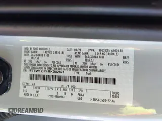2021 Ford F-150 XL with VIN 1FTEW1CP4MKD82871, listed as a IAAI auction lot 42301025 with 54,757 mi miles and . Bid and sale history available at DreamBid. Image 9.