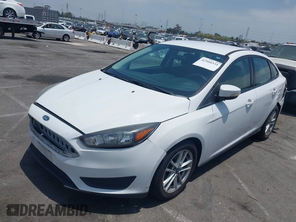 2017 Ford Focus SE with VIN 1FADP3F21HL217838, listed as a IAAI auction lot 42560331 with 154,406 mi miles and . Bid and sale history available at DreamBid. Image 2.