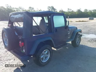 1998 Jeep Wrangler Sport with VIN 1J4FY19S8WP798559, listed as a IAAI auction lot 42162734 with 129,638 mi miles and . Bid and sale history available at DreamBid. Image 4.