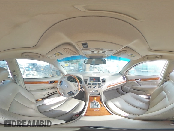 2003 Infiniti Q45 z VIN JNKBF01A03M101890, wystawiony jako Copart lot #86930994 z przebiegiem 158 134 mil mil oraz Szkody całkowita. Historia ofert i sprzedaży dostępna na DreamBid. Obrazek 12.