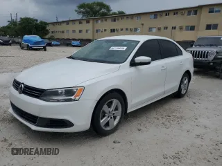 2014 Volkswagen Jetta TDI w/Premium with VIN 3VWLL7AJ2EM266867, listed as a Copart auction lot 52174475 with 73,574 mi miles and Salvage title. Bid and sale history available at DreamBid. Image 1.