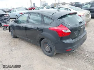 2012 Ford Focus SE with VIN 1FAHP3K27CL455211, listed as a IAAI auction lot 42048868 with 164,474 mi miles. Bid and sale history available at carsss.com. Image 3.