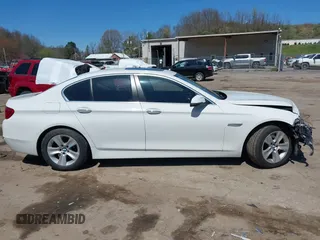 2015 BMW 5 Series 528i xDrive with VIN WBA5A7C54FG143565, listed as a IAAI auction lot 41948957 with 107,255 mi miles and . Bid and sale history available at carsss.com. Image 13.