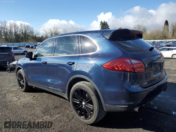 2012 Porsche Cayenne with VIN WP1AA2A20CLA02006, listed as a Copart auction lot 49129885 with 143,605 mi miles and Salvage title. Bid and sale history available at DreamBid. Image 2.