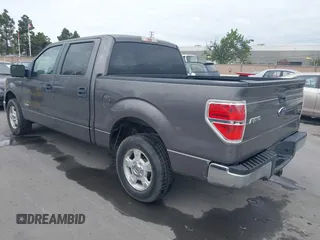 2011 Ford F-150 XLT with VIN 1FTFW1CT8BKD21411, listed as a IAAI auction lot 42077959 with 152,665 mi miles. Bid and sale history available at carsss.com. Image 3.