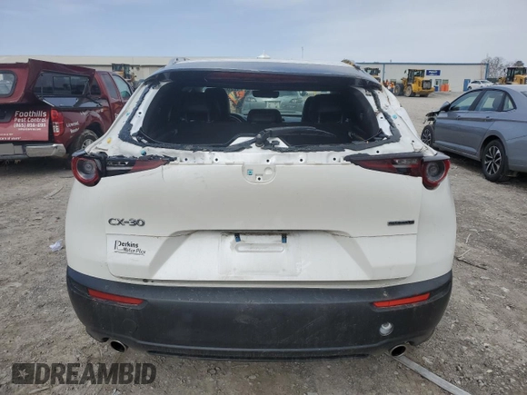 2021 Mazda CX-30 Premium z VIN 3MVDMADM2MM219102, wystawiony jako Copart lot #48200825 z przebiegiem 40 742 mil mil oraz Szkoda całkowita • Salvage title. Historia ofert i sprzedaży dostępna na DreamBid. Obrazek 6.