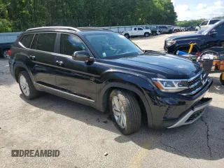 2021 Volkswagen Atlas SEL with VIN 1V2ER2CA5MC542810, listed as a Copart auction lot 57243245 with 104,505 mi miles and Salvage title. Bid and sale history available at DreamBid. Image 4.