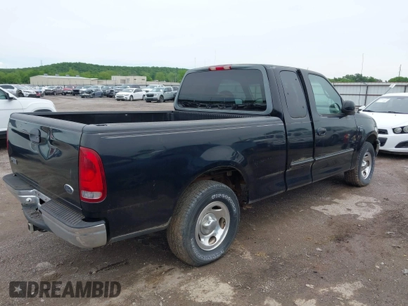2000 Ford F-150 XL with VIN 1FTRX17L6YKA30614, listed as a IAAI auction lot 42110031 with Not provided miles and . Bid and sale history available at DreamBid. Image 4.