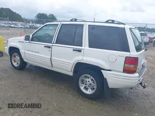 1996 Jeep Grand Cherokee Limited z VIN 1J4GZ78YXTC191527, wystawiony jako IAAI lot #42352616 z przebiegiem 325 927 mil mil oraz . Historia ofert i sprzedaży dostępna na DreamBid. Obrazek 3.