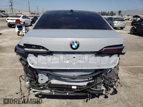 2023 BMW 7 Series 740i with VIN WBA23EH09PCM67327, listed as a Copart auction lot 73387174 with 18,228 mi miles and Salvage Title. Bid and sale history available at carsss.com. Image 6.