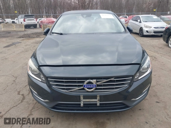 2015 Volvo S60 T5 Platinum with VIN YV1612TDXF1317203, listed as a IAAI auction lot 41715131 with 142,632 mi miles. Bid and sale history available at carsss.com. Image 12.