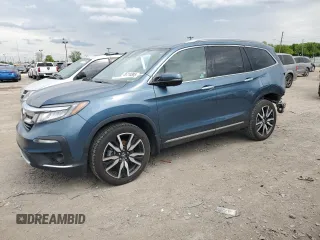 2020 Honda Pilot Touring 7-Passenger z VIN 5FNYF6H64LB022022, wystawiony jako Copart lot #56210385 z przebiegiem Nie podano mil oraz Szkoda całkowita • Salvage title. Historia ofert i sprzedaży dostępna na DreamBid. Obrazek 1.