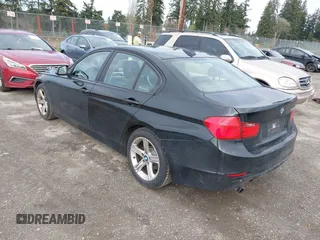 2013 BMW 3 Series 328i with VIN WBA3C1C53DF442532, listed as a IAAI auction lot 41945247 with 92,065 mi miles. Bid and sale history available at carsss.com. Image 3.
