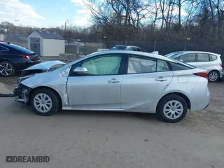 2022 Toyota Prius L Eco with VIN JTDKAMFU7N3176041, listed as a IAAI auction lot 41562977 with 61,964 mi miles. Bid and sale history available at carsss.com. Image 14.