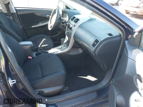 2011 Toyota Corolla L with VIN 2T1BU4EE5BC734666, listed as a IAAI auction lot 41640201 with 205,025 mi miles. Bid and sale history available at carsss.com. Image 5.