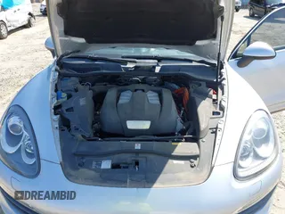 2012 Porsche Cayenne S Hybrid z VIN WP1AE2A20CLA92424, wystawiony jako IAAI lot #42315279 z przebiegiem 129 119 mil mil oraz . Historia ofert i sprzedaży dostępna na DreamBid. Obrazek 10.