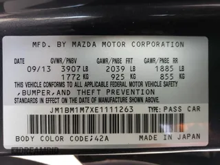 2014 Mazda 3 i Grand Touring with VIN JM1BM1M7XE1111263, listed as a Copart auction lot 80143334 with 167,635 mi miles and Salvage Title. Bid and sale history available at DreamBid. Image 13.