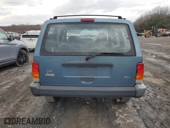 1999 Jeep Cherokee SE with VIN 1J4FF28S9XL576313, listed as a Copart auction lot 88470435 with Not provided miles and Salvage title. Bid and sale history available at DreamBid. Image 6.