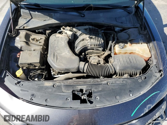 2015 Dodge Charger SXT with VIN 2C3CDXHG9FH856319, listed as a Copart auction lot 57251335 with 171,454 mi miles and Salvage title. Bid and sale history available at DreamBid. Image 11.