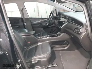2023 Chevrolet Bolt EV 2LT with VIN 1G1FX6S03P4184237, listed as a IAAI auction lot 41565141 with 80,603 mi miles. Bid and sale history available at carsss.com. Image 5.