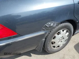 2004 Acura RL w/Navigation System with VIN JH4KA96634C006366, listed as a IAAI auction lot 42054689 with 350,809 mi miles. Bid and sale history available at carsss.com. Image 6.