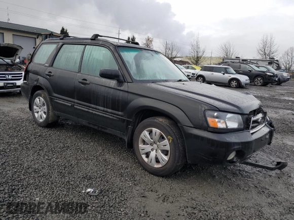 2003 Subaru Forester XS with VIN JF1SG65683H705256, listed as a Copart auction lot 87489904 with 293,143 mi miles and Salvage Title. Bid and sale history available at carsss.com. Image 4.