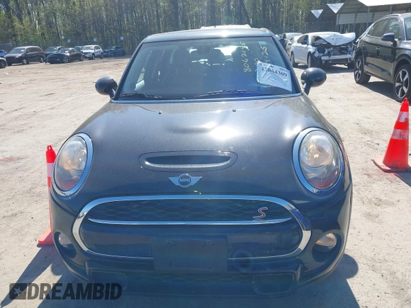 2016 MINI Hardtop 4 Door S z VIN WMWXU3C51G2D29400, wystawiony jako IAAI lot #42064309 z przebiegiem 85 021 mil mil oraz . Historia ofert i sprzedaży dostępna na DreamBid. Obrazek 12.