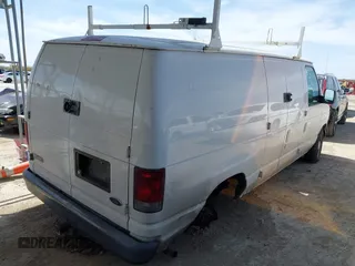 2004 Ford Econoline Cargo with VIN 1FTRE14W44HA29084, listed as a IAAI auction lot 41793350 with 123,429 mi miles. Bid and sale history available at carsss.com. Image 4.