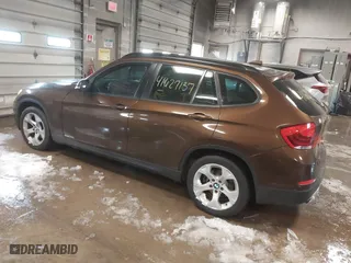 2013 BMW X1 28i with VIN WBAVM1C59DVW42455, listed as a IAAI auction lot 41627137 with 170,120 mi miles. Bid and sale history available at carsss.com. Image 3.