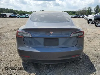 2020 Tesla Model 3 Standard Range Plus with VIN 5YJ3E1EA6LF614045, listed as a Copart auction lot 65222584 with 59,823 mi miles and Salvage Title. Bid and sale history available at DreamBid. Image 6.