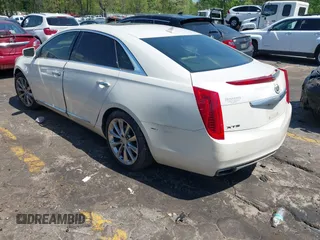 2014 Cadillac XTS Luxury with VIN 2G61M5S32E9310910, listed as a IAAI auction lot 41978298 with Not provided miles and . Bid and sale history available at DreamBid. Image 3.