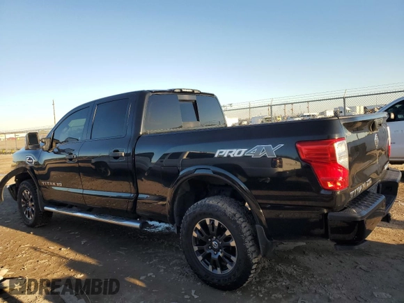 2019 Nissan Titan XD SL with VIN 1N6BA1F43KN529676, listed as a Copart auction lot 79935214 with 135,734 mi miles and Salvage Title. Bid and sale history available at carsss.com. Image 2.