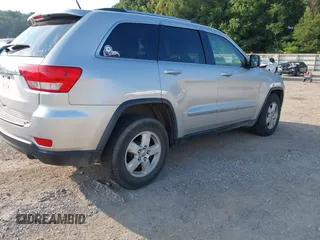 2011 Jeep Grand Cherokee Laredo with VIN 1J4RR4GG2BC514497, listed as a IAAI auction lot 42688206 with 88,822 mi miles and . Bid and sale history available at DreamBid. Image 4.