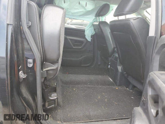 2015 Nissan Titan Pro-4X with VIN 1N6BA0EC1FN507894, listed as a Copart auction lot 65784274 with 147,576 mi miles and Salvage title. Bid and sale history available at DreamBid. Image 11.
