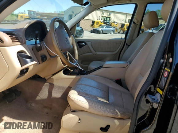 2001 Mercedes-Benz M-Class with VIN 4JGAB54E61A232157, listed as a Copart auction lot 53482584 with 137,549 mi miles and Salvage Title. Bid and sale history available at carsss.com. Image 7.