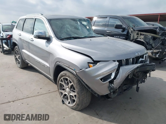 2020 Jeep Grand Cherokee Limited z VIN 1C4RJFBG7LC152068, wystawiony jako IAAI lot #41791286 z przebiegiem 59 989 mil mil oraz . Historia ofert i sprzedaży dostępna na DreamBid. Obrazek 1.