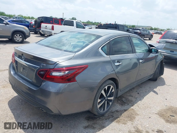 2018 Nissan Altima SR with VIN 1N4AL3AP2JC229312, listed as a IAAI auction lot 42099101 with 106,408 mi miles and . Bid and sale history available at carsss.com. Image 4.